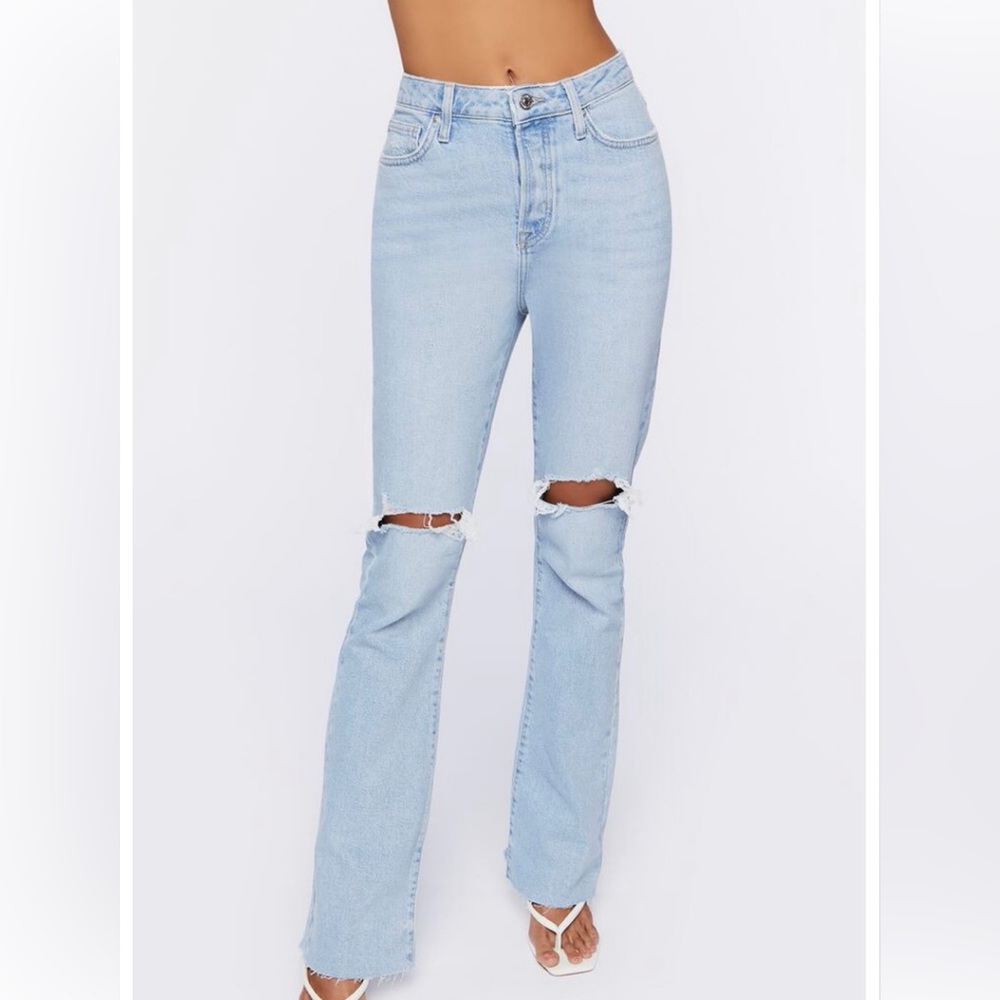 Mid Rise Bootcut Distressed Jeans